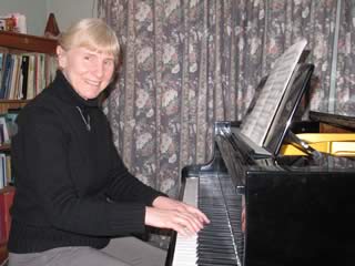 Piano teacher Maryvonne Evans at piano